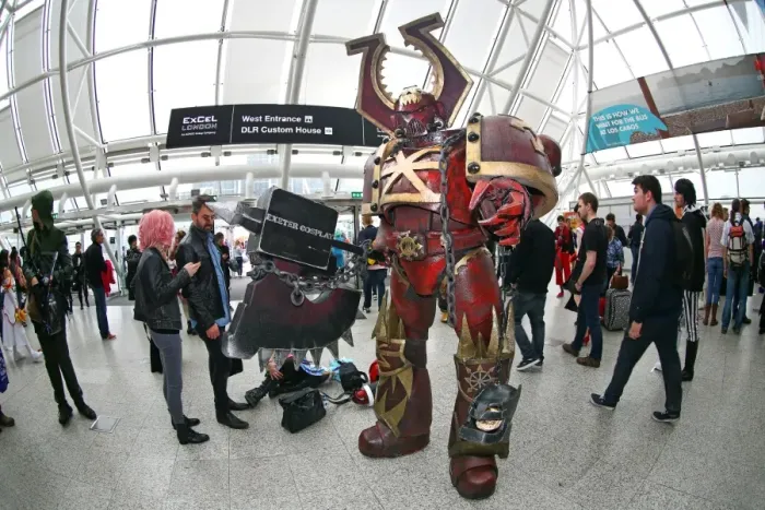 : A Warhammer Chaos Space Marine dwarfs participants at MCM London Comic Con at Excel