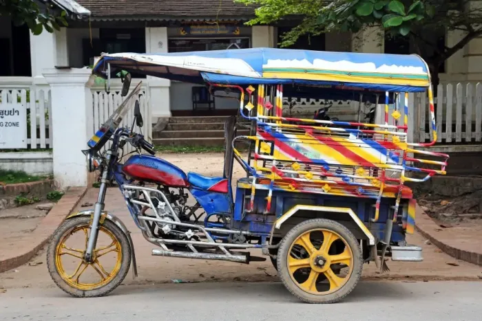  : Three wheeled Tuk Tuk taxi in Luang Prabang, Laos