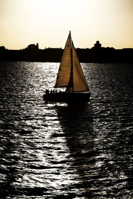  : Yacht sailing on the sea at sunset