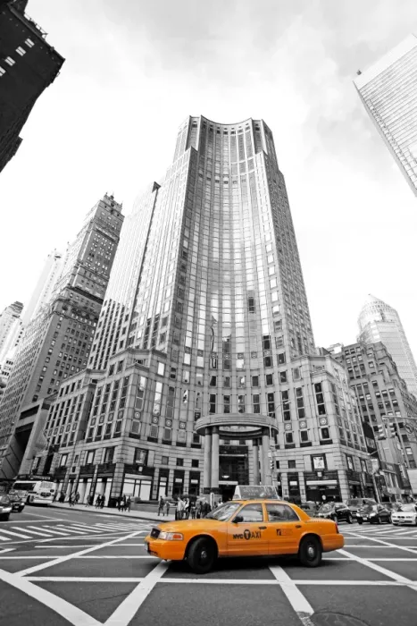  : Yellow taxi cab and skyscraper spot colour street scene, New York, America
