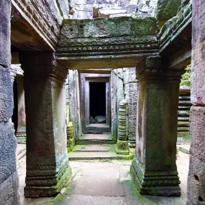 Arched walkways and pillars in the ruins of Bayon Temple, Angkor Thom, Siem Reap