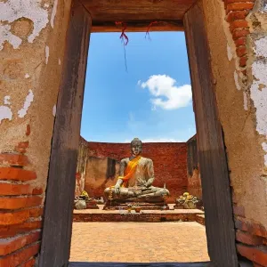 Buddha Statue framed in window frame, Wat Lokayasutharam, Ayutthaya, Thailand