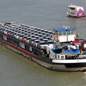 Cargo ship transporting motor cars on the River Danube, Budapest, Hungary
