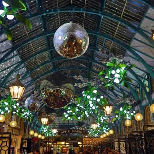 Christmas lights switched on in Covent Garden Market, London