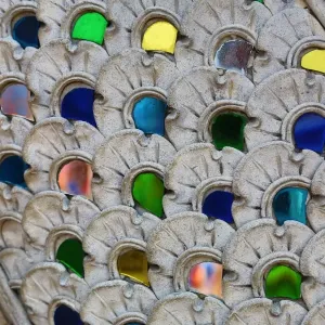 Coloured glass decorations on statues outside Wat Inthakhin Sadue Muang Temple in Chiang Mai, Thailand