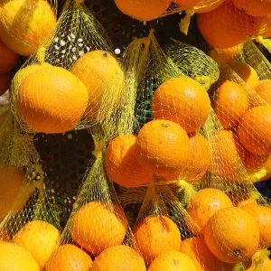 Fresh oranges on sale in the street market in the city of Pompeii, Italy Fresh oranges on sale in the street market in the city of Pompeii, Italy