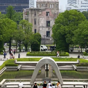 The Genbaku Domu, Atomic Bomb Dome, and the Memorial Cenotaph in the Hiroshima Peace Memorial Park, Hiroshima, Japan