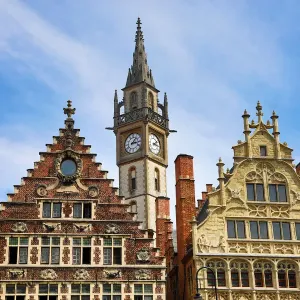 Ghent clock tower and the Vrije Schippers Guildhall, Graslei quay, Ghent, Belgium
