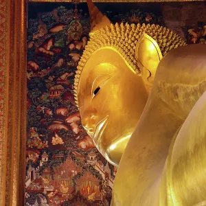 Giant gold reclining Buddha statue at Wat Pho Temple in Bangkok, Thailand