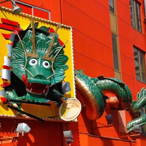 Giant green dragon advertising sign in Dotonbori, Osaka, Japan