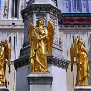 Gold angel statue on the column beside Zagreb Cathedral in Zagreb, Croatia