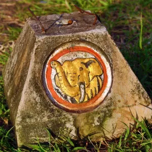 Gold elephant on road marker stone, Vientiane, Laos Gold elephant on road marker stone, Vientiane, Laos