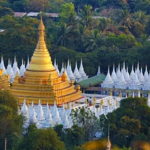 Gold stupa and white dhamma ceti shrines of Sandamuni Pagoda, Mandalay, Myanmar (Burma)