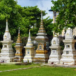 Graves in a cemetery at Wat Si Saket Buddhist Temple, Vientiane, Laos Graves in a cemetery at Wat Si Saket Buddhist Temple, Vientiane, Laos