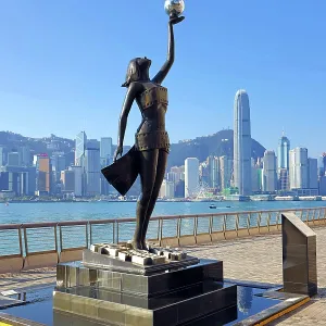 The Hong Kong Film Awards Statue, of a Goddess holding a Pearl, in front of Victoria Harbour, Hong Kong, China The Hong Kong Film Awards Statue, of a Goddess holding a Pearl, in front of Victoria Harbour, Hong Kong, China