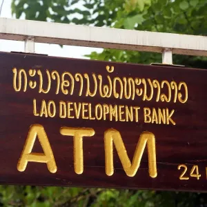 Lao Development Bank ATM cashpoint sign in Luang Prabang, Laos