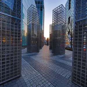 Metal structures beside the office blocks at dusk in the Gangnam district, Seoul, Korea