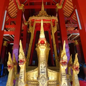 Naga on the golden ceremonial barge in the funeral chapel of Vat Xieng Thong Temple