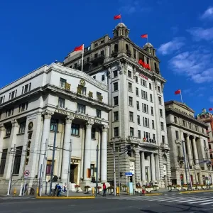 North China Daily News Building housing AIA, American International Assurance, and the China Merchant Bank building on the Bund, Shanghai, China