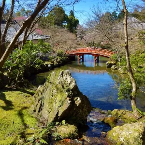 Ornamental Japanese wooden bridge at Daigoji Buddhist Temple in Kyoto, Japan