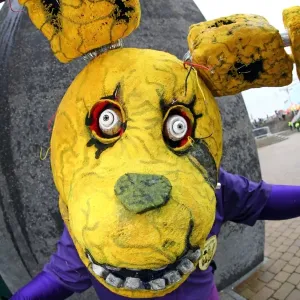 A participant dressed as the Purple Guy with the Spring Trap at MCM London Comic