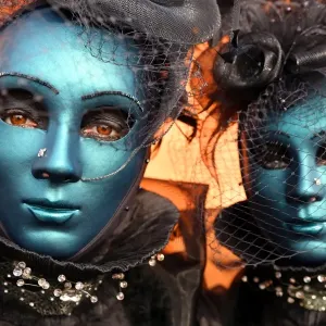 People wearing masks and costumes at the Venice Carnival