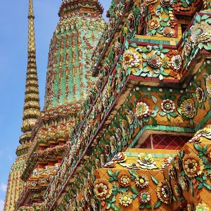 Porcelain covered chedis, known as Phra Maha Chedi Si Rajakarn, at Wat Pho Temple, Bangkok, Thailand