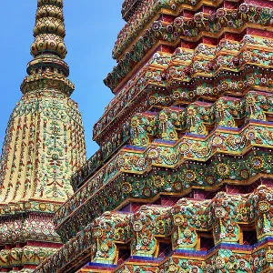 Porcelain covered chedis, known as Phra Maha Chedi Si Rajakarn, at Wat Pho Temple, Bangkok, Thailand