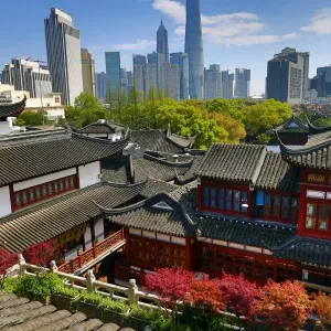 The Pudong city skyline in Shangha in the background of the Yuyuan gardens in the Old City, Shanghai, China