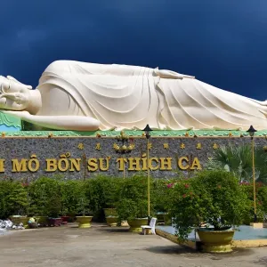 Reclining Buddha statue at Vinh Trang Temple, near My Tho, Mekong Delta, Vietnam Reclining Buddha statue at Vinh Trang Temple, near My Tho, Mekong Delta, Vietnam