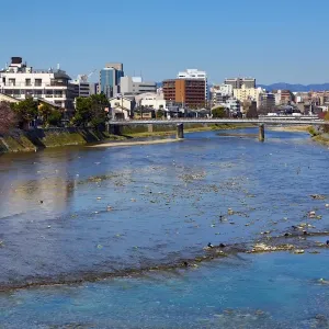 River Kamo and general city view of Kyoto, Japan