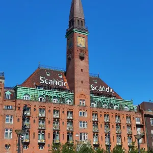 Scandic Hotel building and clock tower in Radhuspadsen the Town Hall Square in Copenhagen