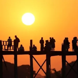 Silhouettes on the U Bein Bridge st sunset, Amarapura, Myanmar