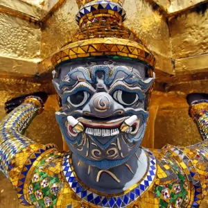 Spot colour Yaksha Demon Statue at Wat Phra Kaew temple, Bangkok, Thailand Spot colour Yaksha Demon Statue at Wat Phra Kaew temple, Bangkok, Thailand