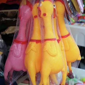 Squeaky plastic chickens for sale on Koh Samet island, Thailand