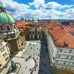 St Francis of Assisi Church and rooftops of the Prague city skyline in the Czech Republic
