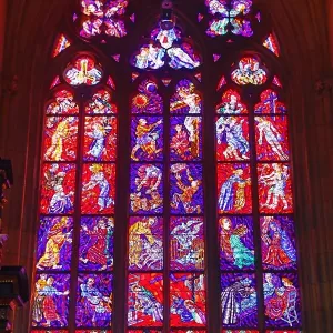 Stained glass windows of St. Vitus Cathedral in Prague, Czech Republic