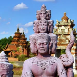 Statues forming a bridge at Muang Boran, The Ancient City, historical museum of reproductions of famous Thai buildings, Bangkok, Thailand