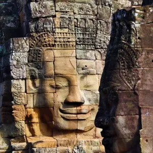 Stone face in the ruins of the Bayon Khmer Temple, Angkor Thom, Siem Reap, Cambodia