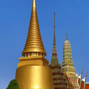 Stupas and chedis at Wat Phra Kaew Royal Palace complex in Bangkok, Thailand Stupas and chedis at Wat Phra Kaew Royal Palace complex in Bangkok, Thailand