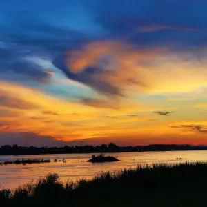 Sunset over the Mekong River, Vientiane, Laos Sunset over the Mekong River, Vientiane, Laos