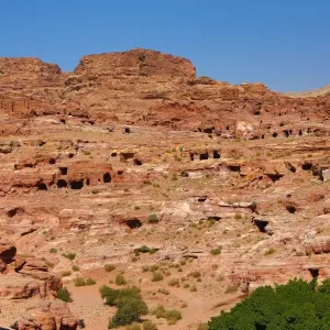 Tombs in sandstone rocks in the rock city of Petra, Jordan