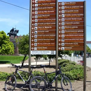 Tourist information signs with directions to famous landmarks in King Tomislav Square in Zagreb