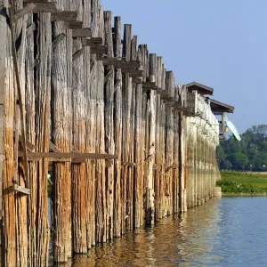 The U Bein Bridge across the Taungthaman Lake in Amarapura, Mandalay, Myanmar (Burma)