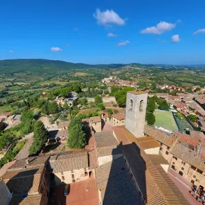 View from the Torre Grossa over the rooftops of San Gimignano and the Tuscan countryside View from the Torre Grossa over the rooftops of San Gimignano and the Tuscan countryside