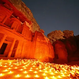 View of the Treasury, Al-Khazneh, at night with candles, Petra, Jordan