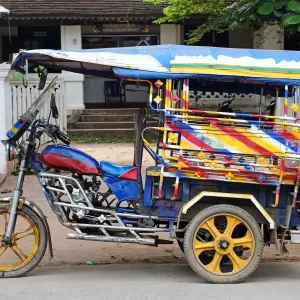 Three wheeled Tuk Tuk taxi in Luang Prabang, Laos