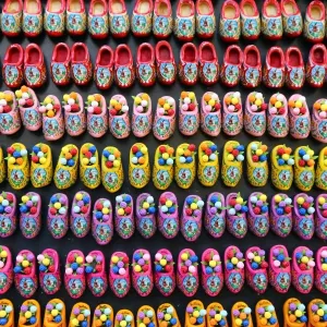 Wooden clogs fridge magnets on sale in the flower market in Amsterdam, Holland