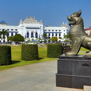 Yangon City Hall and lion statue in Maha Bandola Garden park, Yangon, Myanmar