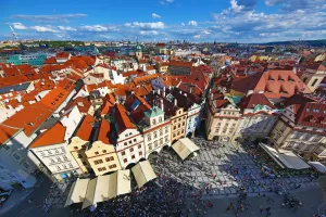 Square: Aerial view of city skyline and the rooftops of buildings in Old Town Square, Prague